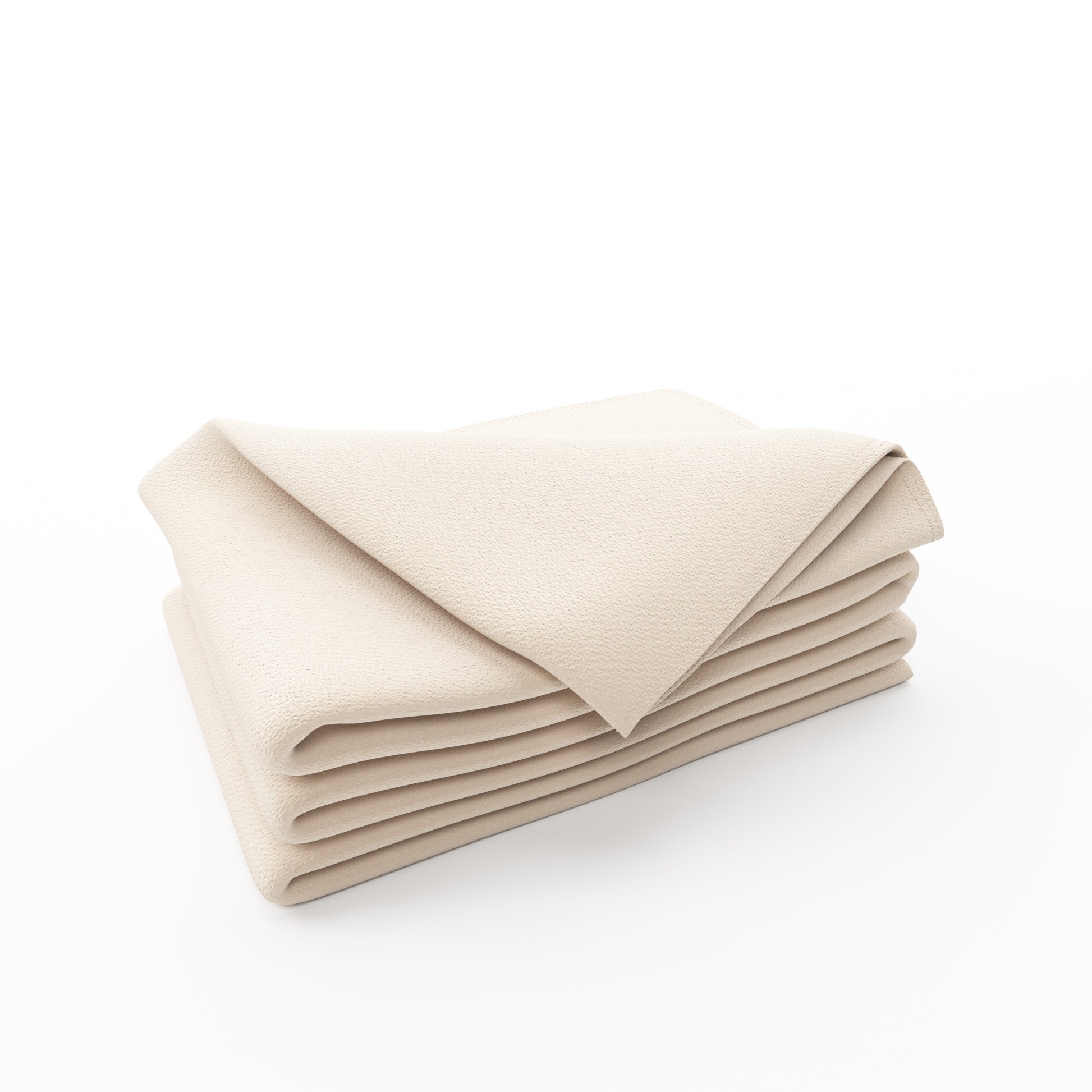 Organic cotton knitted blanket neatly folded on a white background
